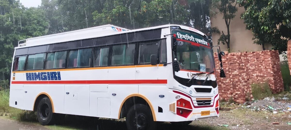 White 35 seater non-AC bus
